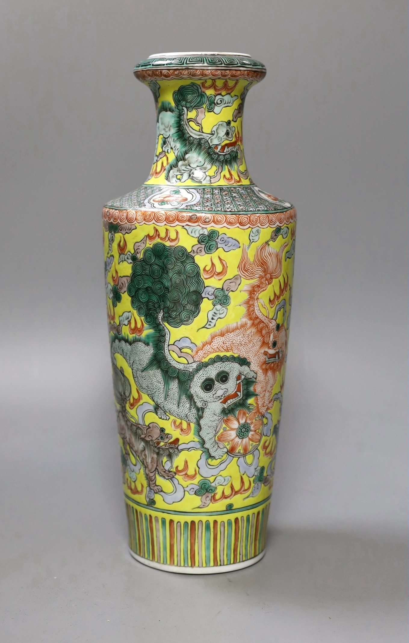 A late 19th century Chinese famille verte ‘lion dog’ vase - 34cm